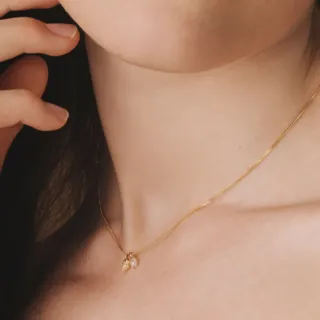 Halskette Schneckenmuschel mit Perle - gold